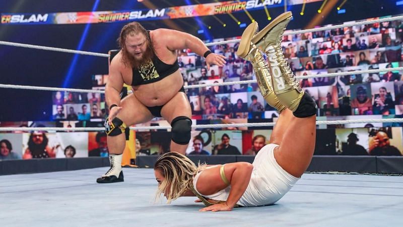 Otis celebrating with Mandy Rose